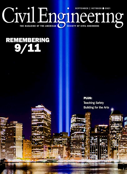 magazine cover showing two beams of light on the site of the former World Trade Towers in NYC